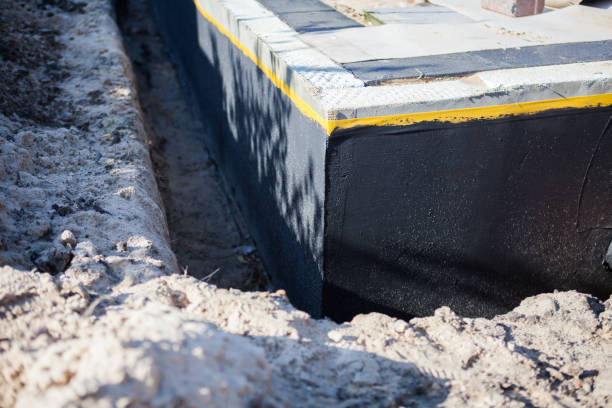 Professional Basement Waterproofing technician working in Prattville, AL
